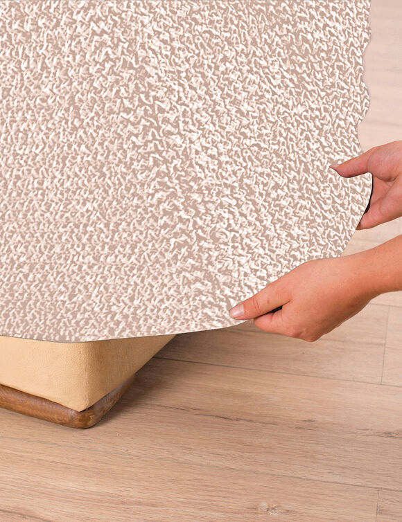 Housse bi-extensible microfibre gaufrée pour fauteuil et canapé (beige) Housse bi-extensible microfibre gaufrée pour fauteuil et canapé (beige)